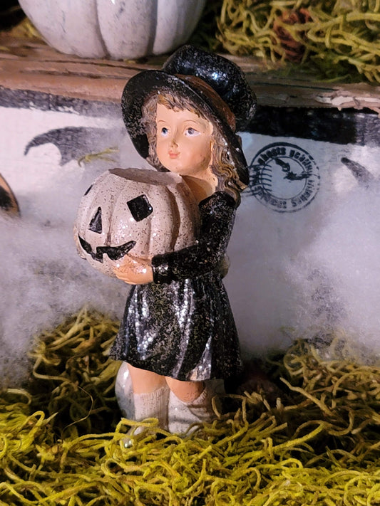 Vintage Halloween Style Glittered Girl in Hat with Pumpkin